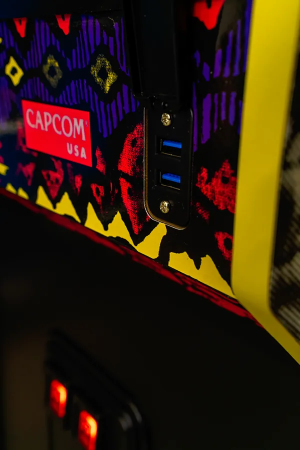 Capcom USA badge on the Street Fighter II XT side art
