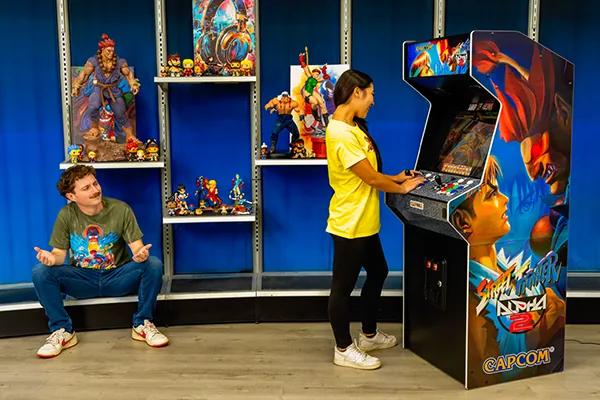Playing the Street Fighter Alpha 2 XT in a game room